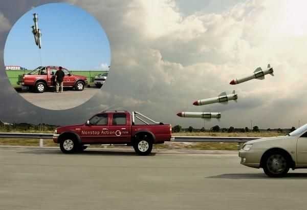 car with balloons shaped liked missiles attached... when moving the missiles pull down behind the car