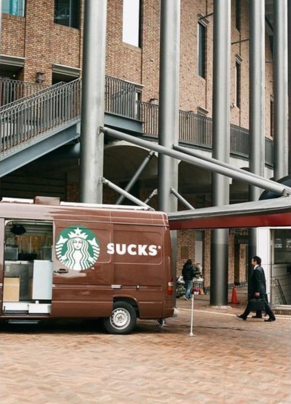 Car doors resulting in starbucks logo and SUCKS